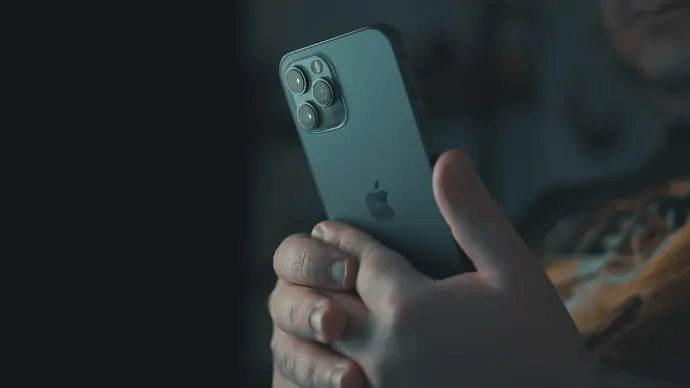 Person holding a mobile phone